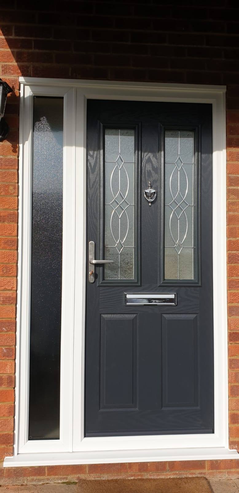 Black Composite Door with White Door Frame