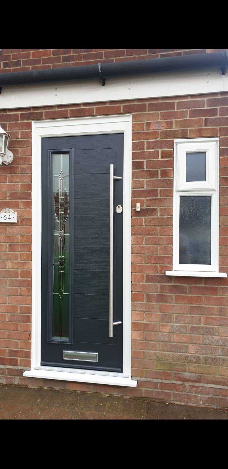 Black Composite Door with White Door Frame