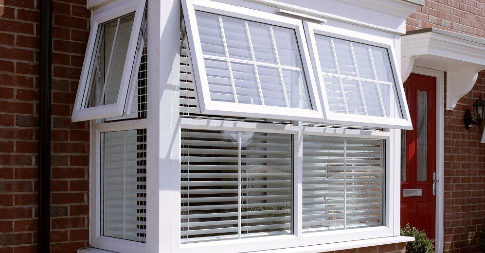 Partially Opened White Aluminium Bifold Doors