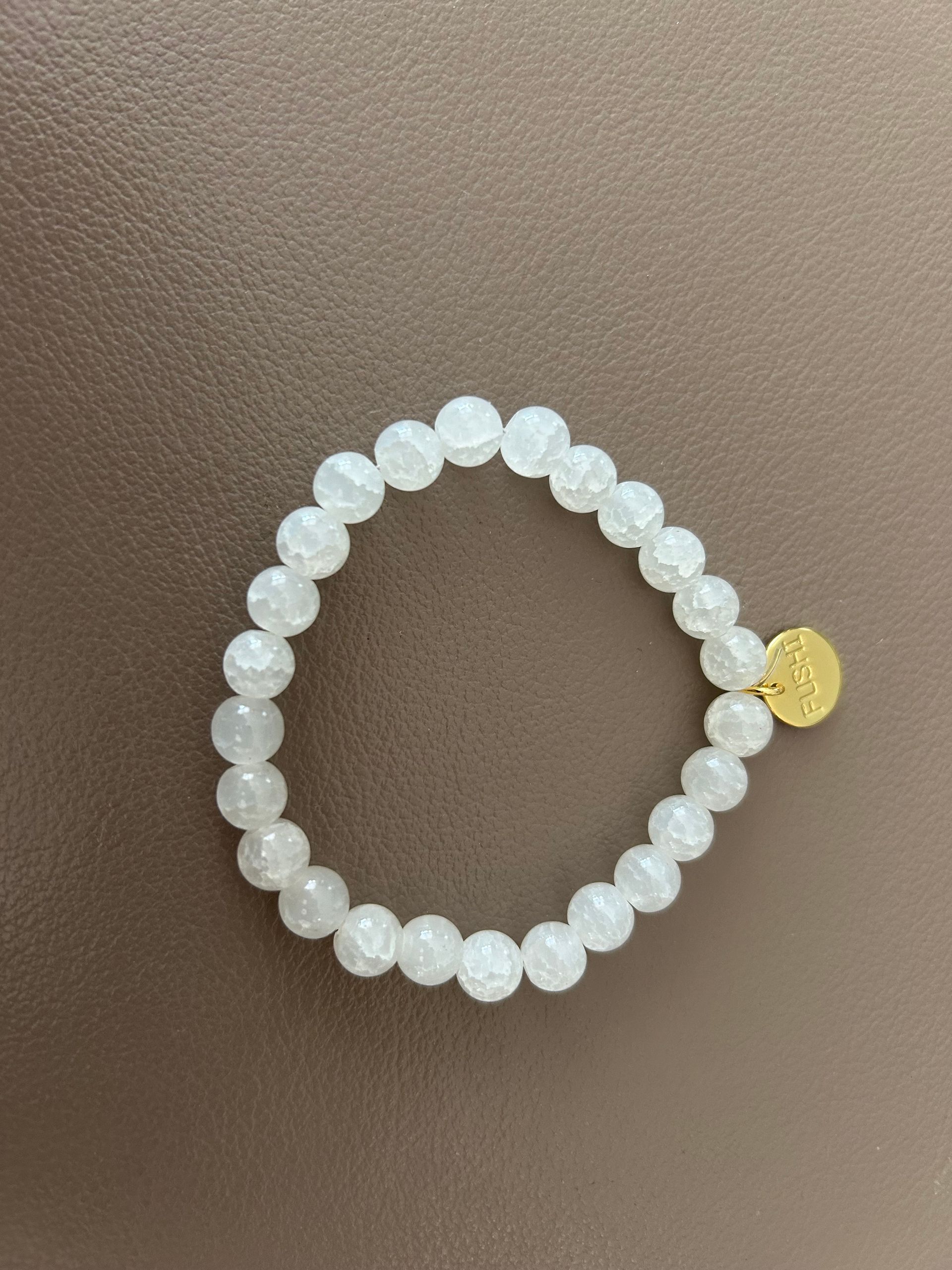 Armband glaskralen crackle wit / transparant 8mm