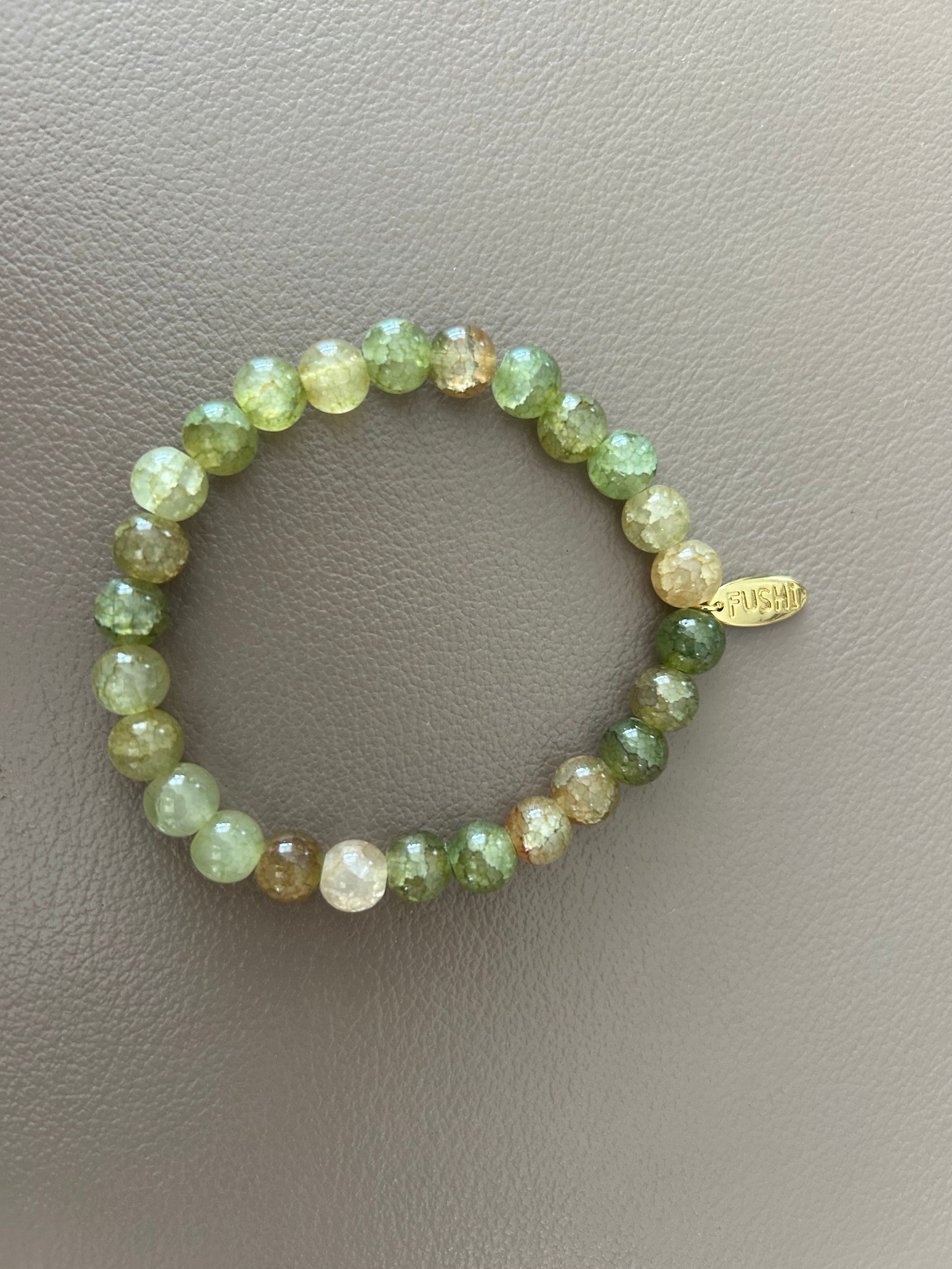 Armband glaskralen crackle groen 8mm
