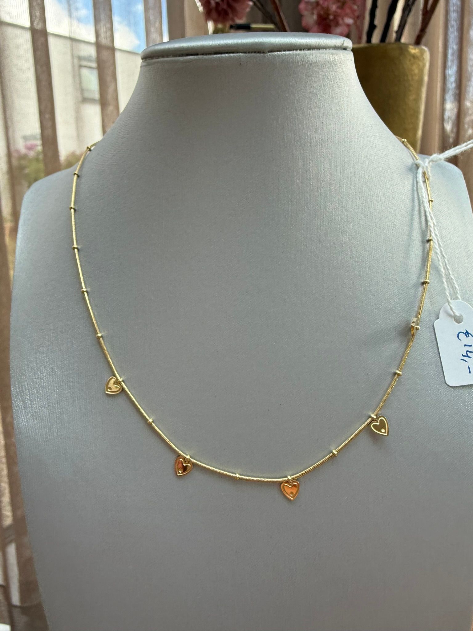 Wauw ketting met gouden hartjes