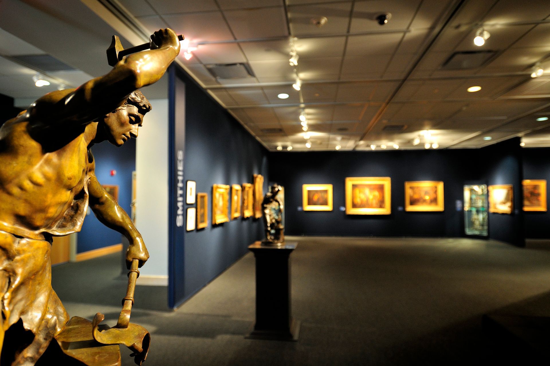 View of a museum space featuring museum lighting products above its exhibits.