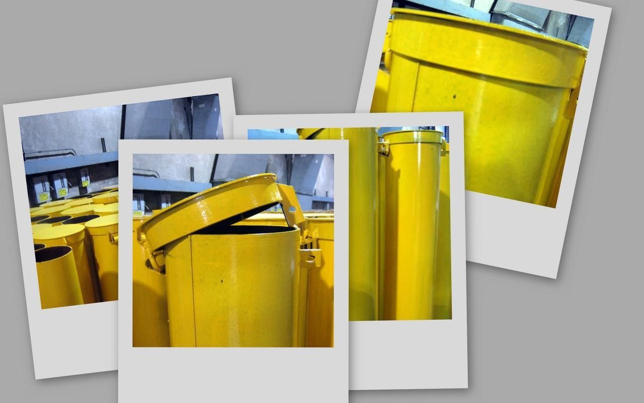 A close up of a yellow pole on a white background.