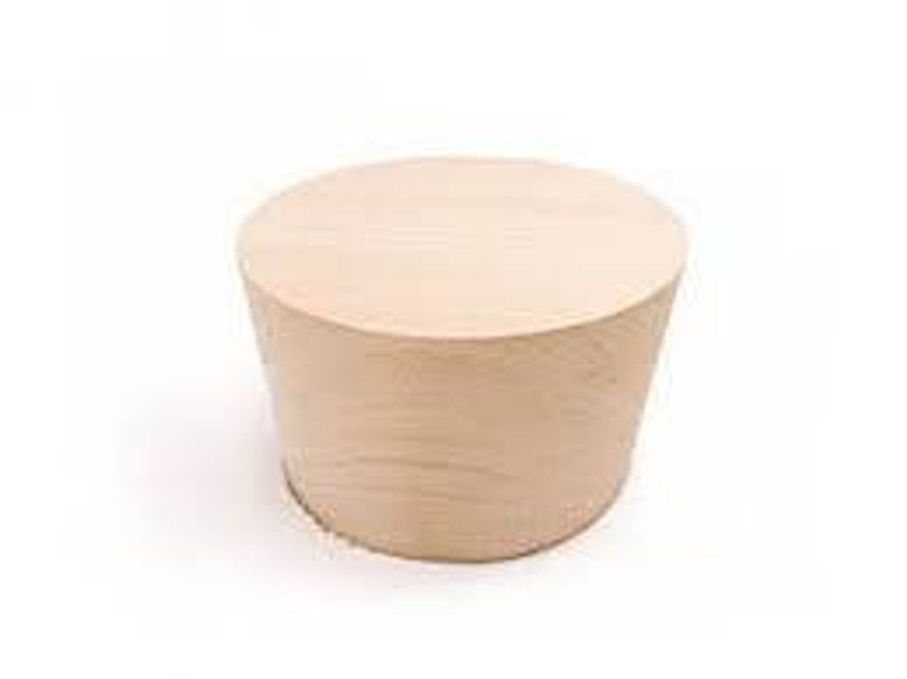 A wooden cylinder is sitting on a white surface.