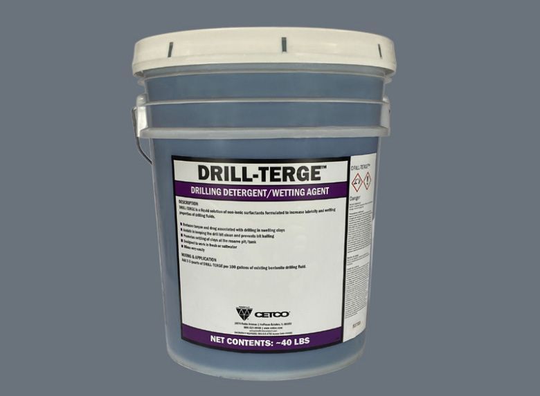 A bucket of drill-terge on a gray background