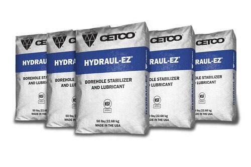 A group of bags sitting next to each other on a white surface.