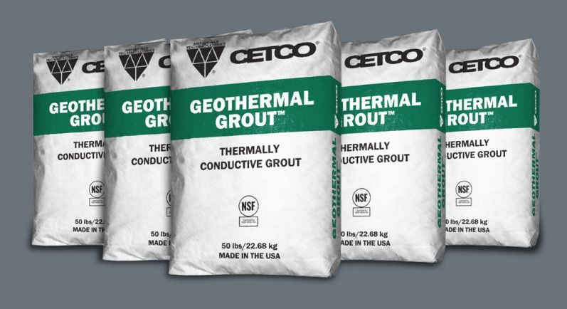 Several bags of geothermal grout are lined up in a row