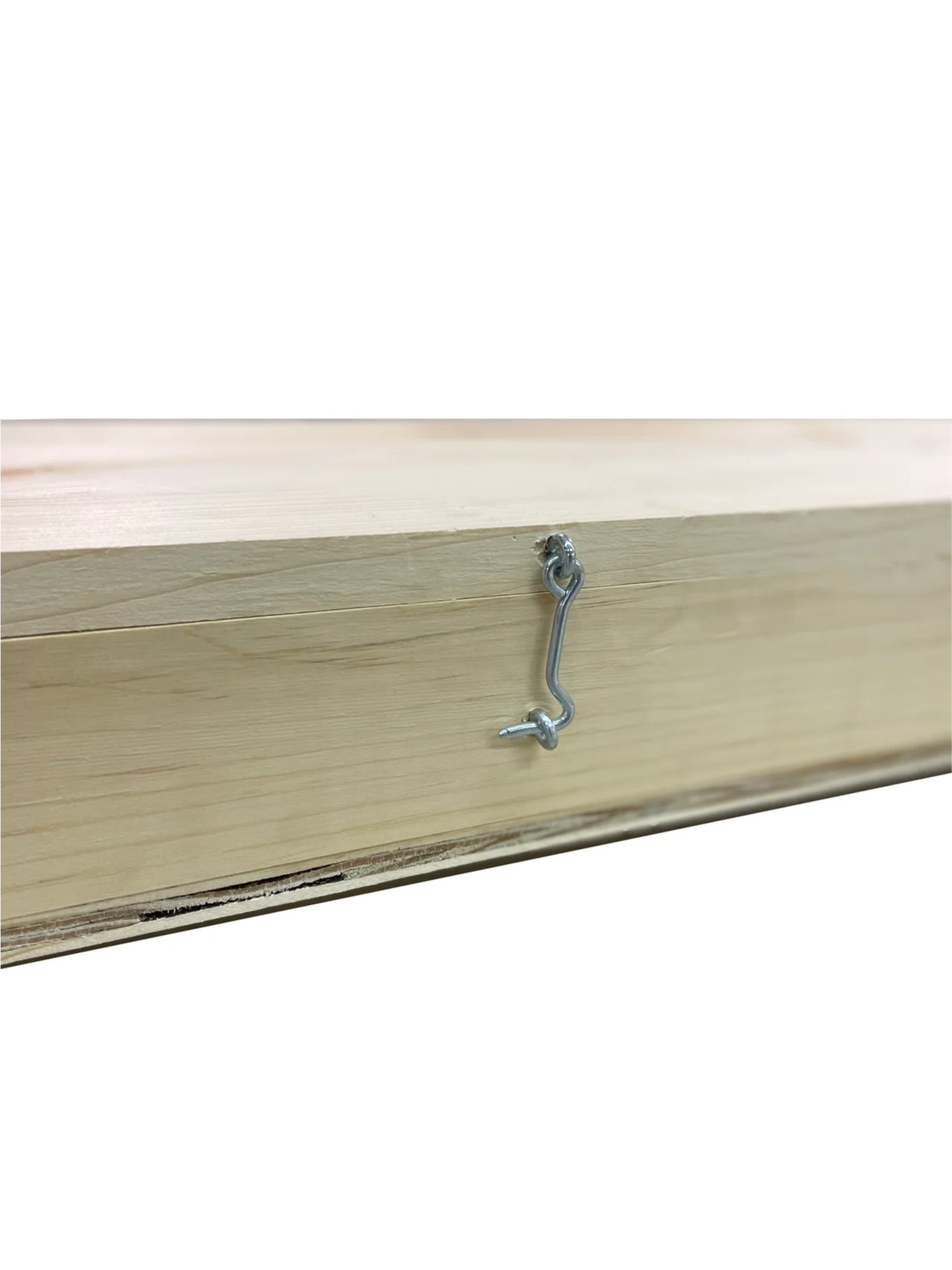 A wooden box with a ruler inside of it