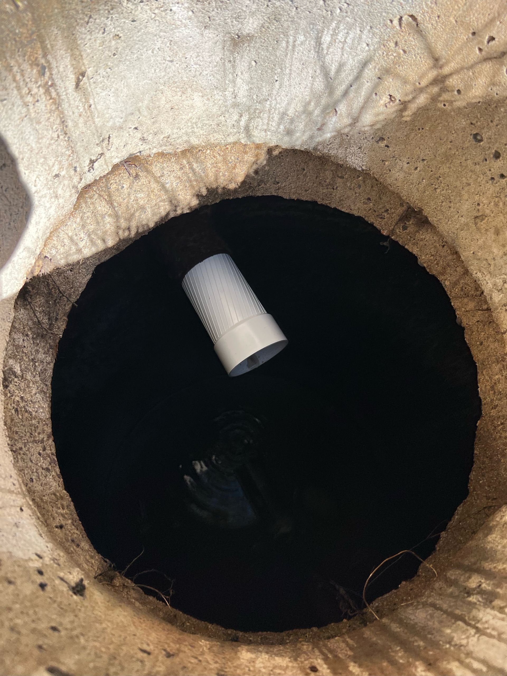 Sewage pumping machine is unclogging blocked manhole — Delta, CO — On a Budget Rooter