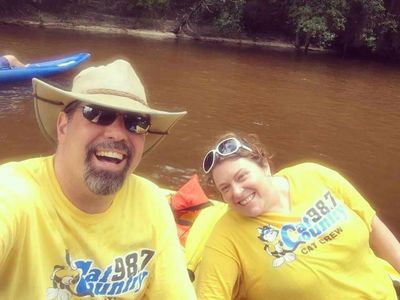 River Trips— Two Persons Smiling While Canoeing in Milton, FL