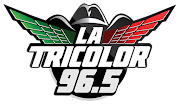 Logo for La Tricolor 96.5 radio station. Features a cowboy hat with green and red wings above the words 