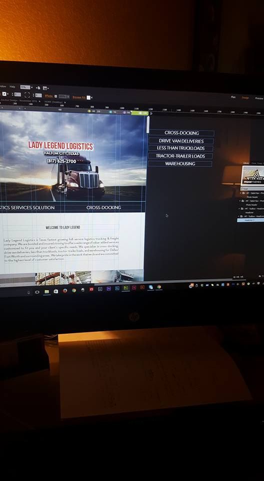 A computer monitor with a picture of a truck on the screen.