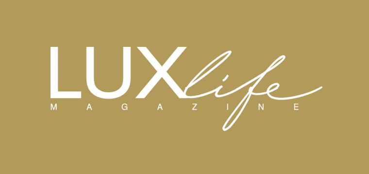 The lux life magazine logo is on a gold background.