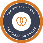 A badge that says top digital agency featured on upcity