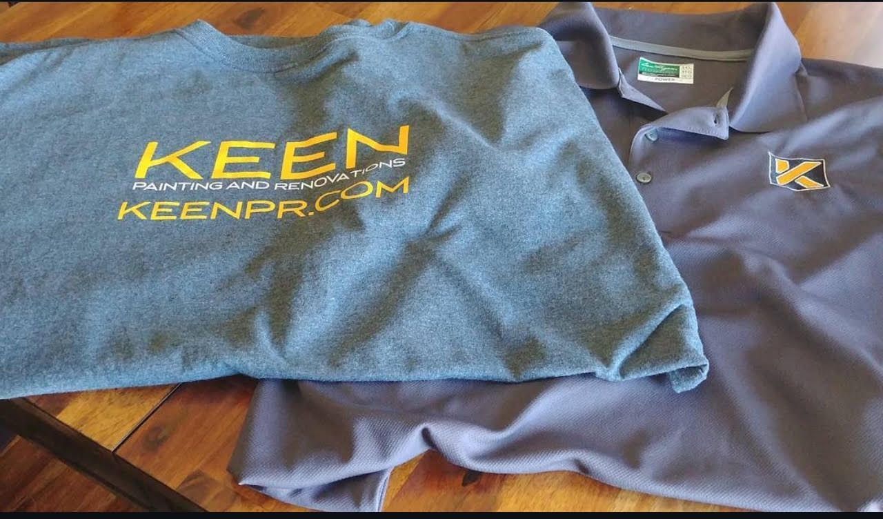 A shirt that says keen on it next to another shirt