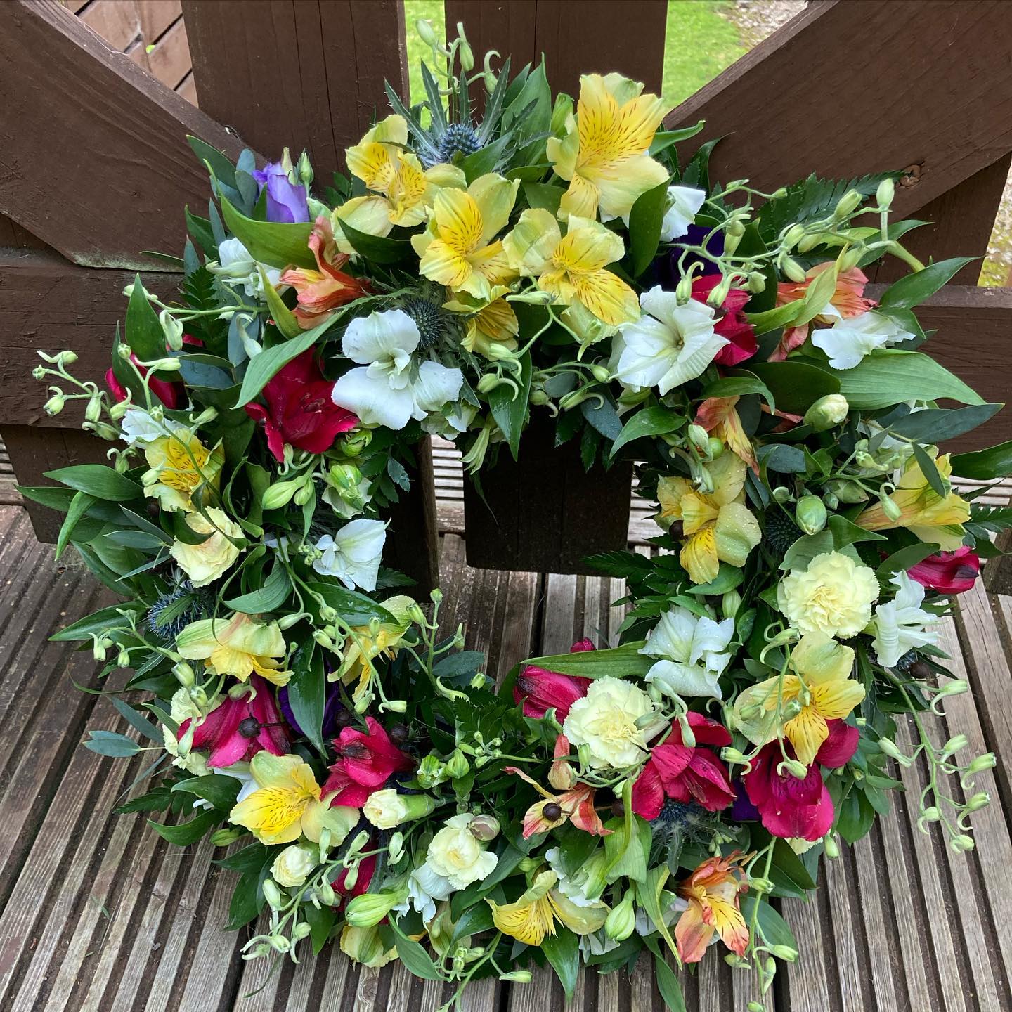 Funeral Wreath created by  Rachel's Country flowers who is a specialist funeral florist situated in the Scottish Highlands. Covering Edderton, Tain, Seaboard Villages, Balintore, Hilton, Fearn, Portmahomack, Invergordon, Alness, Dornoch, Golspie, Ardgay, Lairg. Lettering casket sprays, sheafs, posies and wreaths