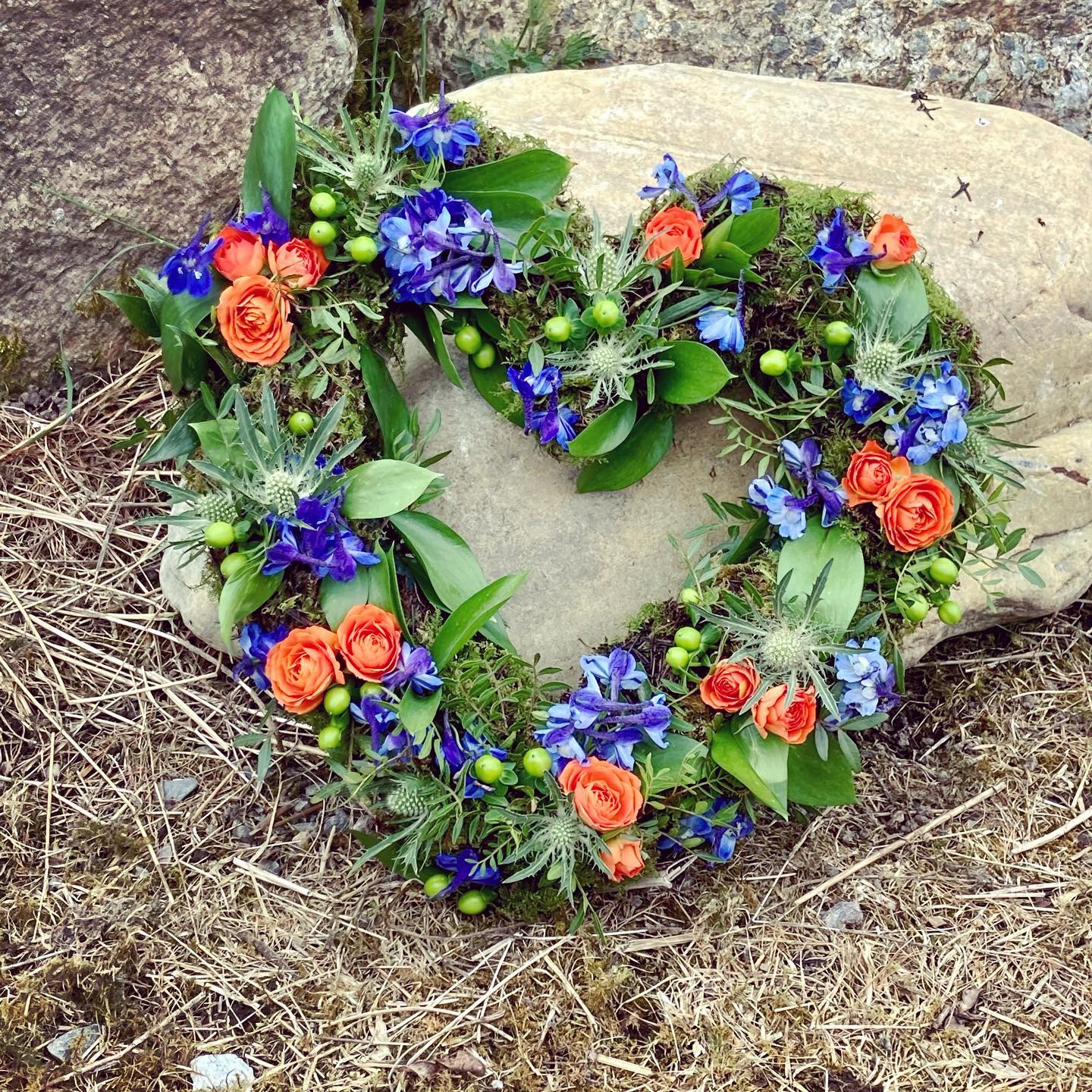 Funeral Heart Wreath created by  Rachel's Country flowers who is a specialist funeral florist situated in the Scottish Highlands. Covering Edderton, Tain, Seaboard Villages, Balintore, Hilton, Fearn, Portmahomack, Invergordon, Alness, Dornoch, Golspie, Ardgay, Lairg. Lettering casket sprays, sheafs, posies and wreaths