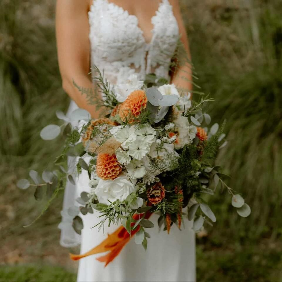 Beautiful bespoke wedding flowers created by Rachel's Country Flowers in the Scottish Highlands. Tain, Skibo, Dornoch, Inverness, Seaboard Villages. Bridal bouquets, arches, bridesmaids bouquets, buttonholes, venue flowers, milk churns, church flowers, top table flowers, Dornoch cathedral flowers, ceremony flowers, hair flowers