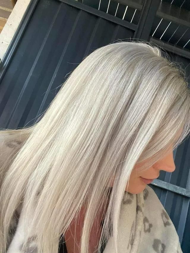 A Woman with A Long Platinum Blonde Hair — Eco Village Hair in Bongaree, QLD
