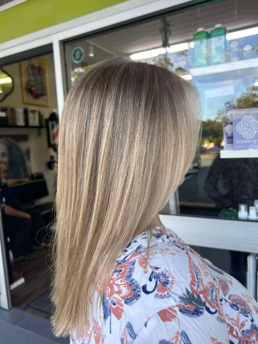 A Woman with Long Blonde Hair — Eco Village Hair in Bongaree, QLD