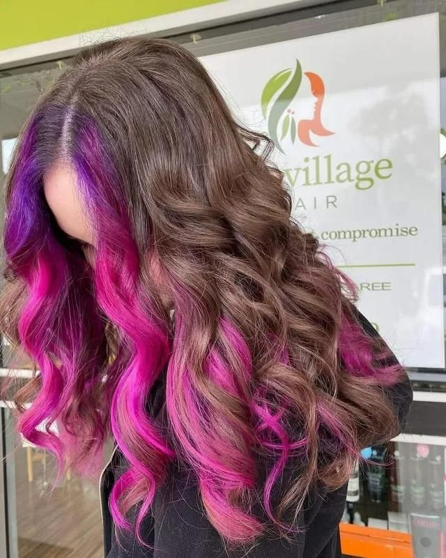 A Woman with Pink and Purple Hair in Front of A Sign that Says Eco Village Hair — Eco Village Hair in Bongaree, QLD