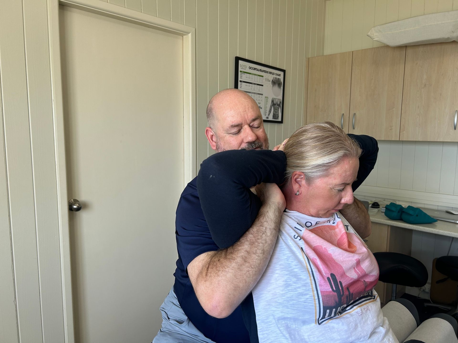 A Person Receiving Chiropractic Care — Wide Bay Chiropractic in Gympie, QLD