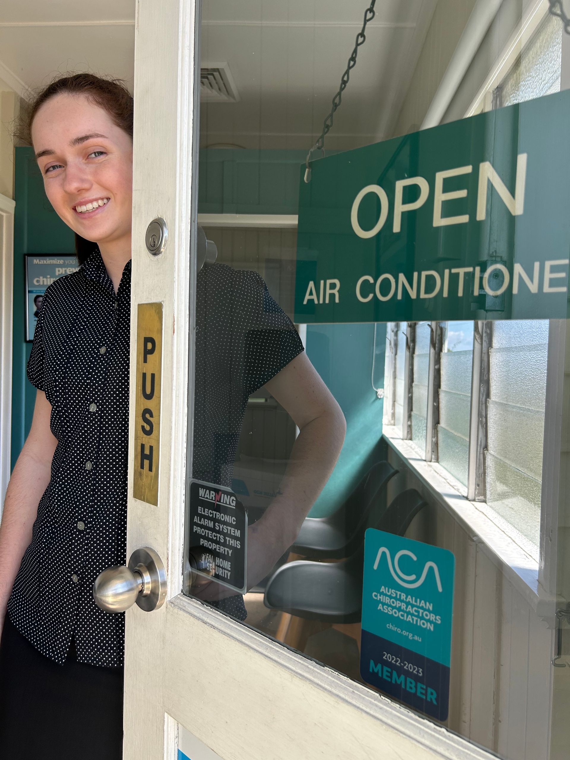 Woman Smiling — Wide Bay Chiropractic in Gympie, QLD