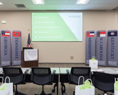 A classroom with tennessee georgia mississippi and kentucky flags