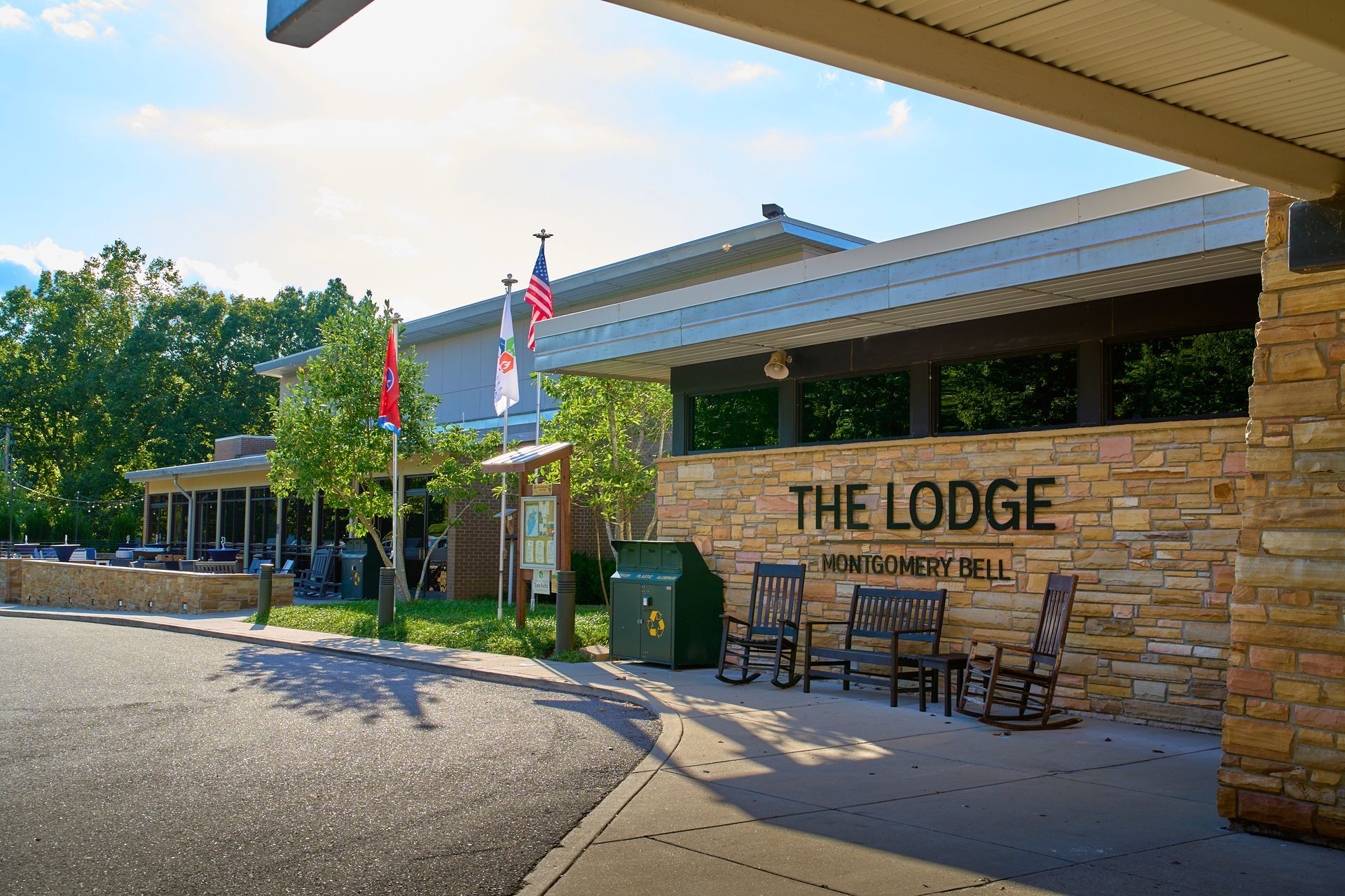A large stone building with the word lodge on it