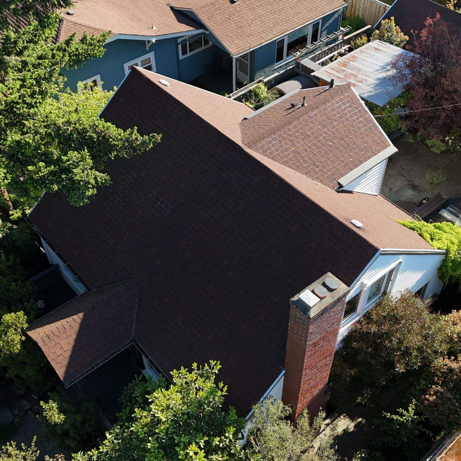 Roofing company local contractor residential services Five Corners WA showing Valiant Roofing, a locally owned and founder operated company led by Jack Divine, with in house crews delivering consistent, high quality workmanship on residential roofing projects. The image highlights a professional team working directly for the company, not subcontractors, reinforcing reliability, accountability, and strong local roots near Vancouver WA. Backed by Owens Corning Platinum Preferred certification, BBB accreditation, and a 4.9 star reputation, this represents a licensed, bonded, and insured roofing contractor focused on quality, clear communication, and long term protection homeowners can trust