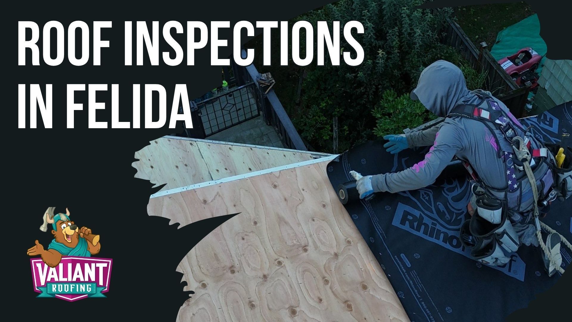 A roofer in safety gear works on a wooden roof structure, with 