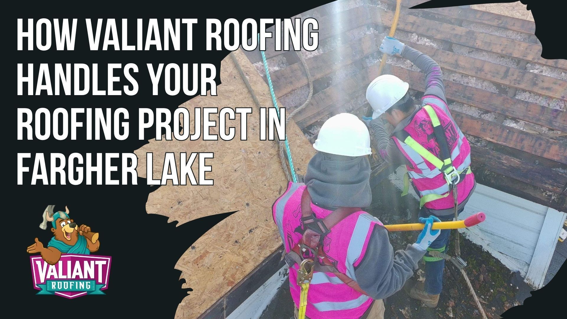 Two construction workers in white hard hats and pink safety vests work on a wooden roof structure in Fargher Lake.