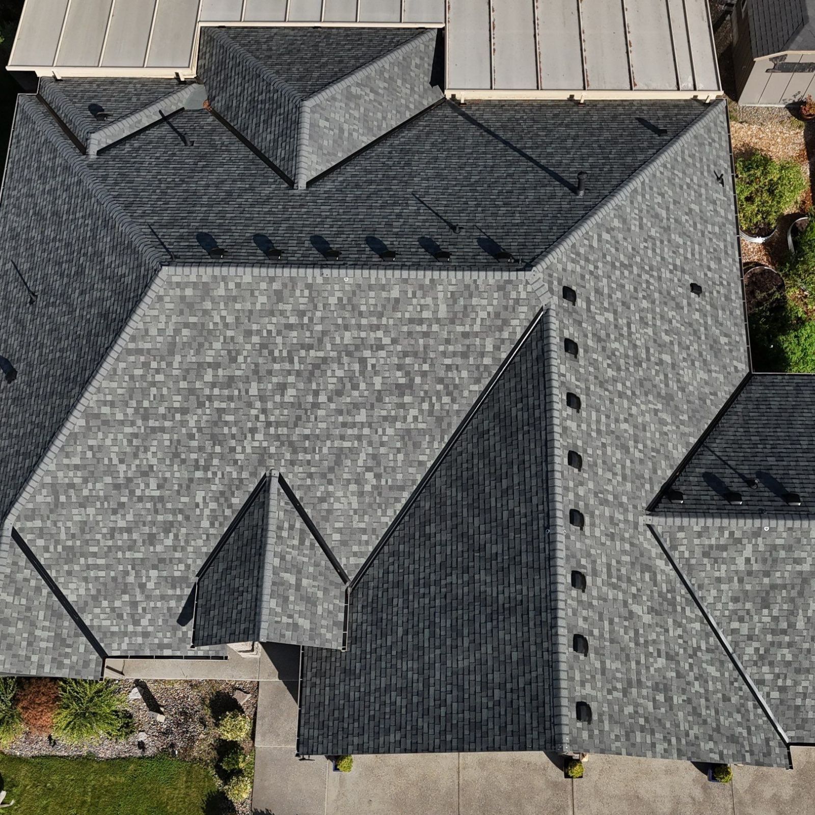 Best Time to Replace a Roof in Hockinson, WA
A four panel seasonal calendar wraps around a Hockinson, WA home showing how each part of the year affects roof replacement timing in this elevated, wind exposed pocket of Clark County. The summer panel shows a clear blue sky and a crew installing architectural shingles in peak season conditions, with a sticky note flagging four to six week booking lead times. Fall fades into amber leaves and cooler temperatures around 45 degrees F, the sweet spot for asphalt adhesion before November rain rolls in. Winter pours sheets of rain onto a tarped section, illustrating short daylight hours and slowed crew progress. Spring opens with sunshine returning, drying out the roof and pricing competitively.
Address: 108 SE 124th Ave Suite 8, Vancouver, WA 98684
https://www.valiantroofing.com/locations/vancouver-wa