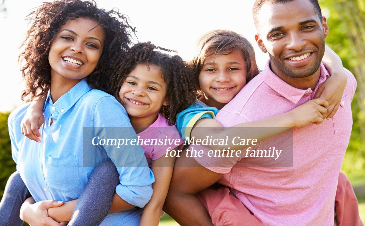 A family is posing for a picture with the words comprehensive medical care for the entire family.