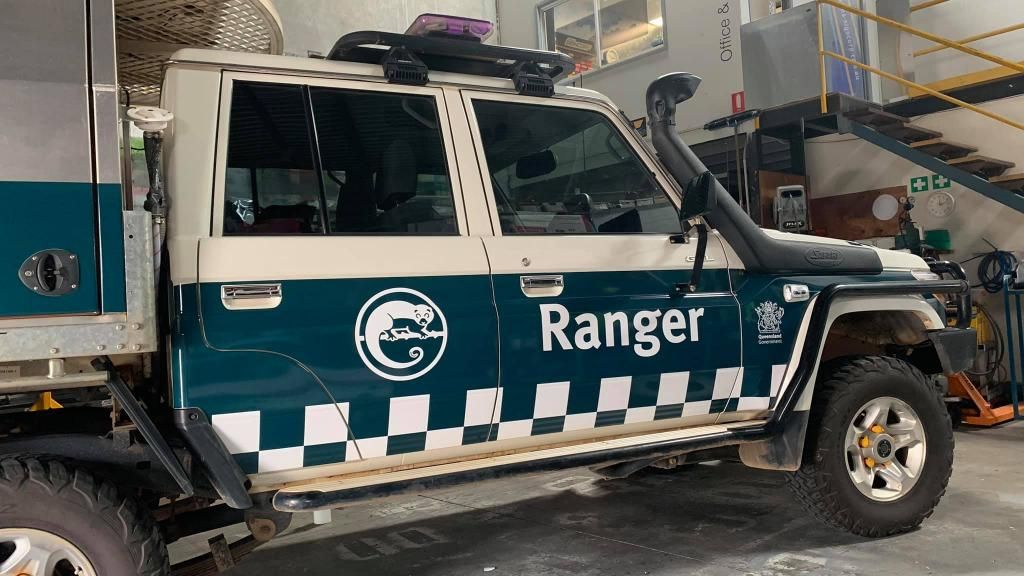 A Green And White Ranger Truck Is Parked In A Garage — Cairns Signcorp In Portsmith, QLD