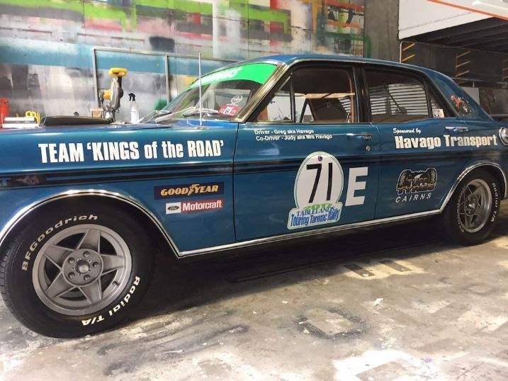 A Blue Race Car With The Number 71 On The Side Is Parked In A Garage — Cairns Signcorp In Portsmith, QLD