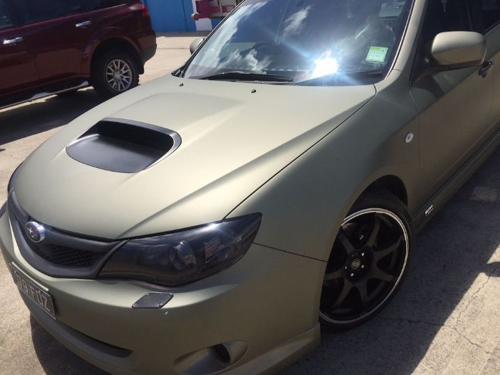 A Grey Subaru Is Parked In A Parking Lot — Cairns Signcorp In Portsmith, QLD