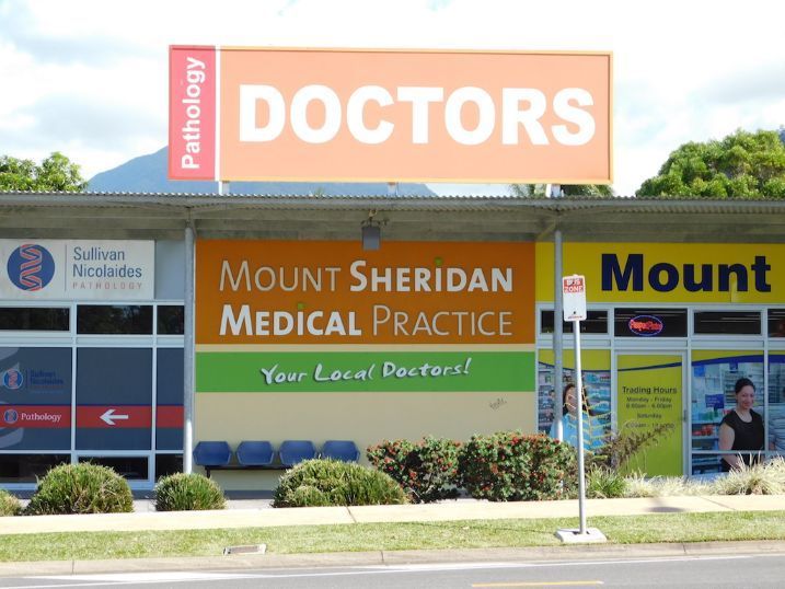 A sign for mount sheridan medical practice is on the side of a building — Cairns Signcorp In Portsmith, QLD