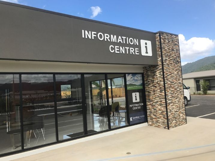 A Building With A Sign That Says Information Centre — Cairns Signcorp In Portsmith, QLD