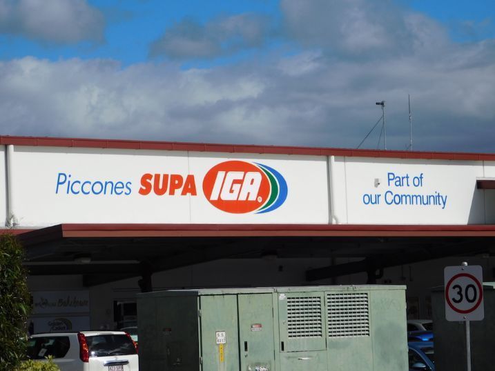 A Building With A Sign That Says Piccones SUPA IGA — Cairns Signcorp In Portsmith, QLD