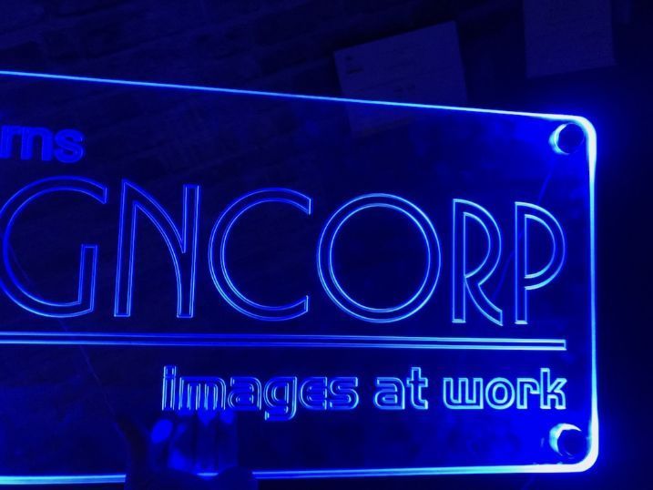 A Neon Blue Sign For Cairns Signcorp — Cairns Signcorp In Portsmith, QLD