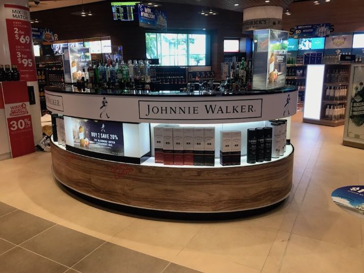 A Johnnie Walker Display In A Store — Cairns Signcorp In Portsmith, QLD