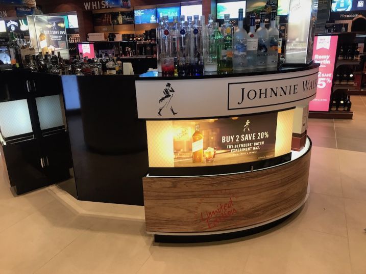 A Johnnie Walker Bar In A Store With A Sign That Says Buy 2 Save 30 % — Cairns Signcorp In Portsmith, QLD