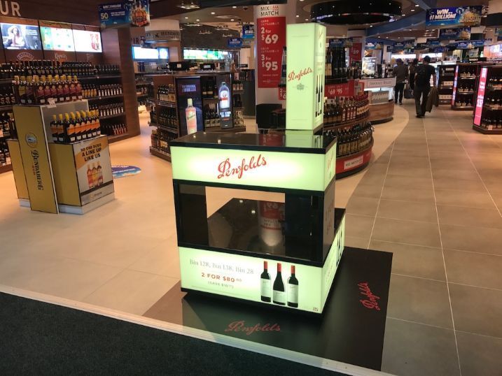 A Display Of Penfolds Wine Bottles In A Store — Cairns Signcorp In Portsmith, QLD