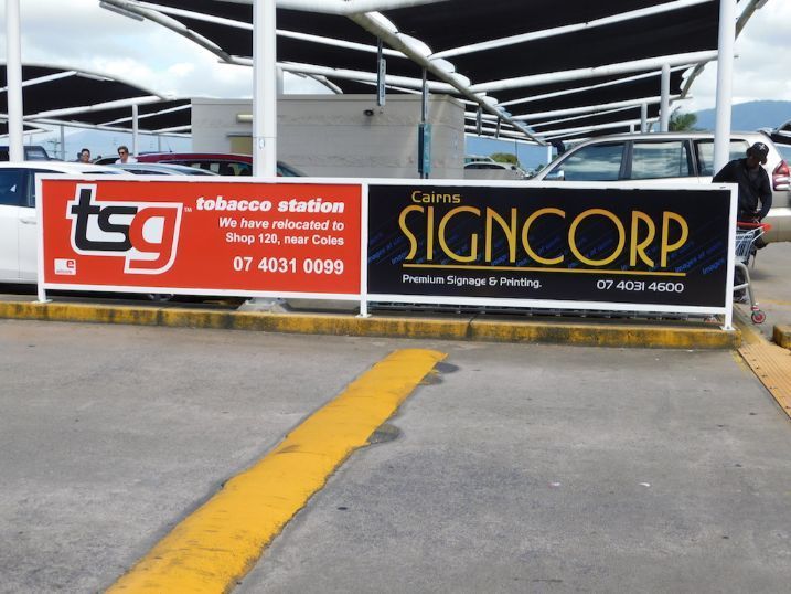 A Sign That Says Signcorp On It In A Parking Lot — Cairns Signcorp In Portsmith, QLD