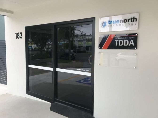 A Building With A Sign That Says Tdda On It — Cairns Signcorp In Portsmith, QLD