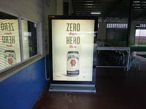 A Large Billboard With A Picture Of A Can Of Jim Beam Beer — Cairns Signcorp In Portsmith, QLD