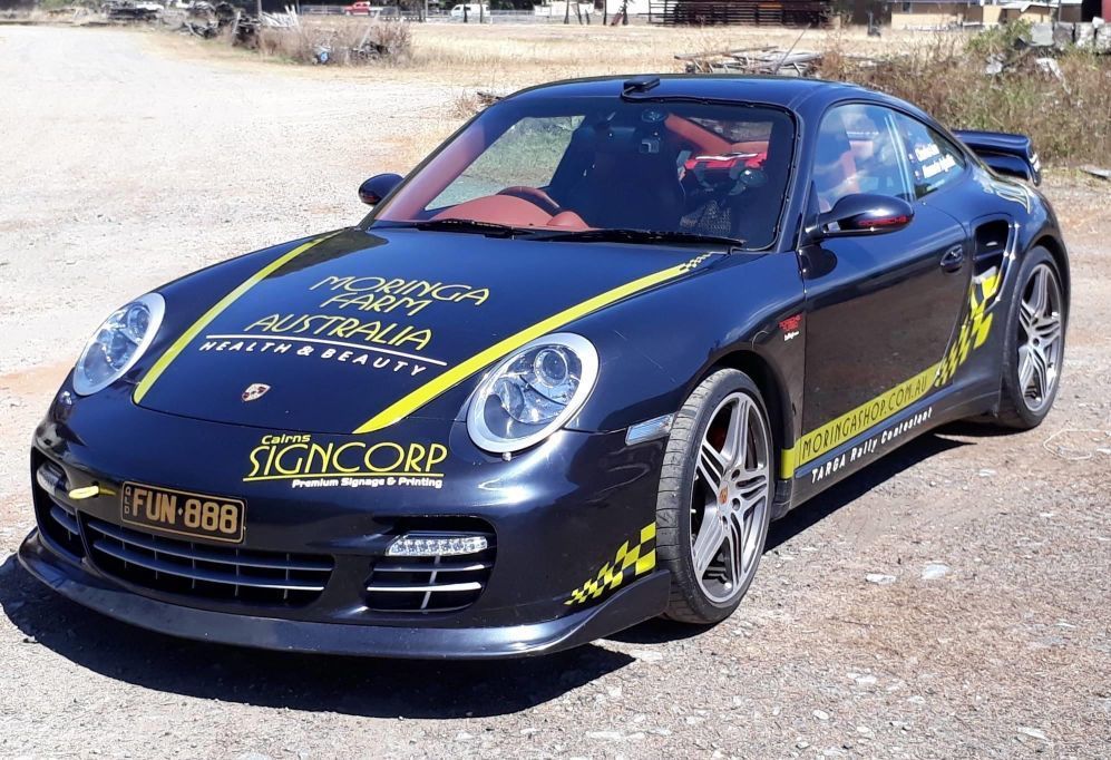 A Sports Car With A License Plate That Says Fun 888 — Cairns Signcorp In Portsmith, QLD