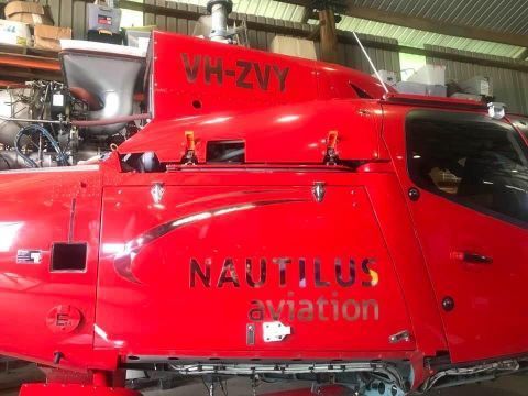 A Red Helicopter With The Word Nautilus Aviation On The Side — Cairns Signcorp In Portsmith, QLD